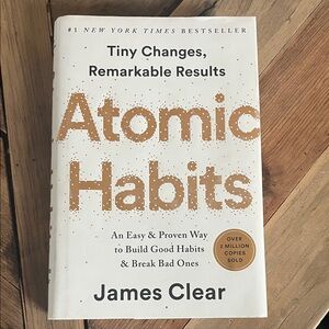 Atomic Habits by James Clear - White and Gold Cover